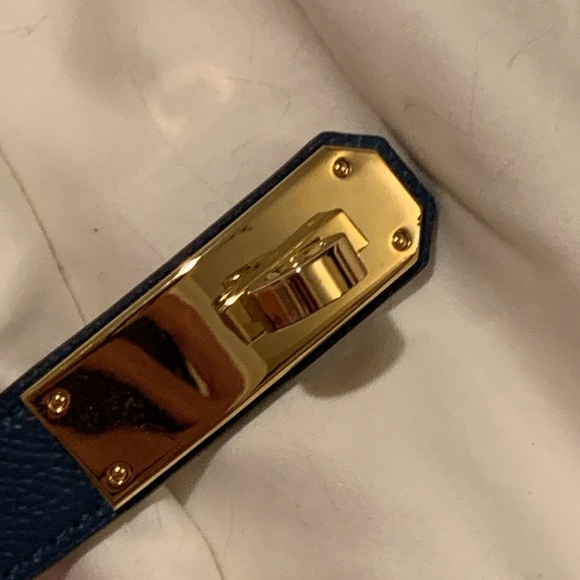 Brand new thin trendy navy belt , adjustable size L 30 . Never been worn…